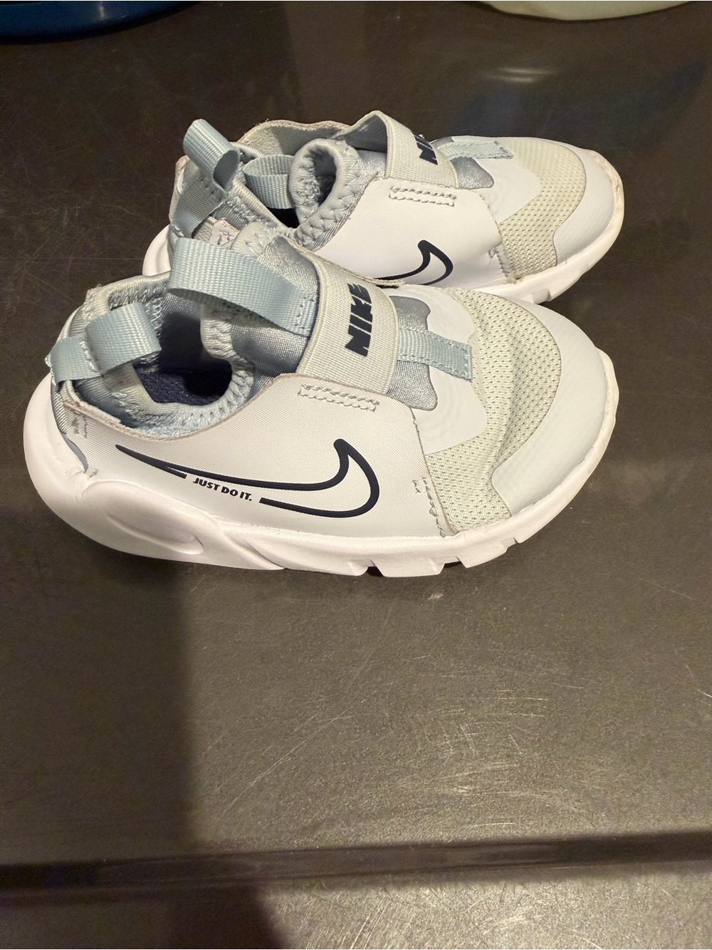 Nike Kids Light Gray and White Slip-On Athletic Sneakers